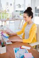 A businesswoman is working on her computer