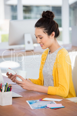 A business woman is opening a box