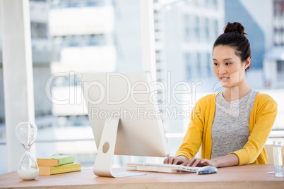 A beautiful businesswoman at her desk