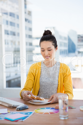 A businesswoman eating