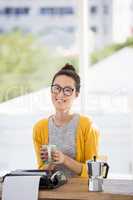 Hipster holding a cup of coffee