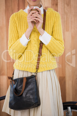 Hipster holding a coffee