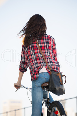 Hipster riding a bike