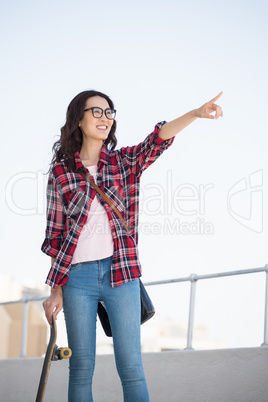 Hipster with skateboard