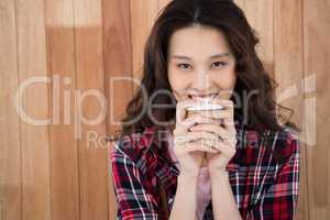 Hipster holding a cup of coffee