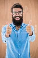 Hipster with thumbs up