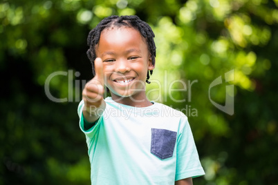 Smiling boy with thumbs up