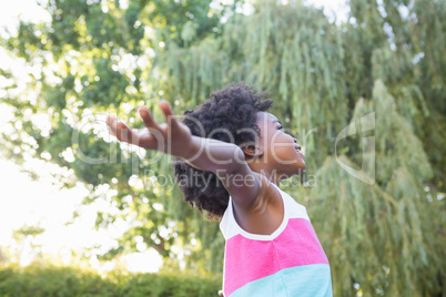 Child with arms outstretched