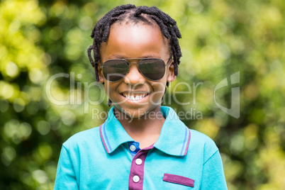 Smiling boy wearing sunglasses