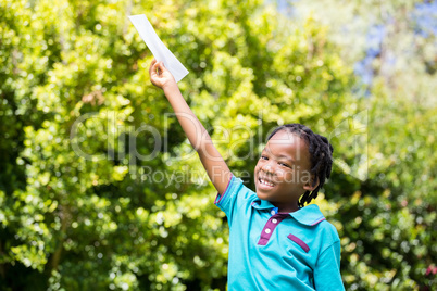 Smiling boy holding a paper