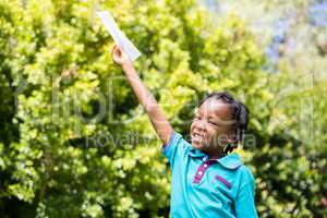 Smiling boy holding a paper