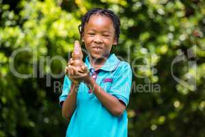 Smiling boy holding a chocolate bunny