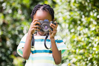 A child is taking pictures