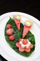 Appetizer of watermelon with ricotta