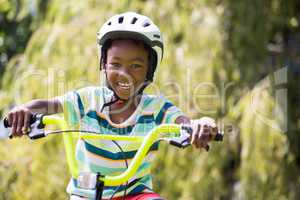 A sporty kid bike riding