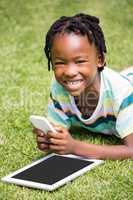 Portrait of kid holding a mobile phone
