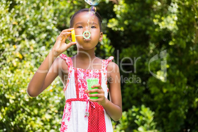 Girl is making bubble