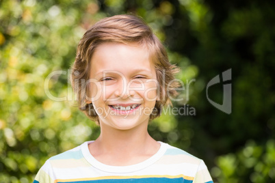 A little boy is smiling