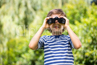 Portrait of cute boy using binoculars Portrait of cute boy using binoculars
