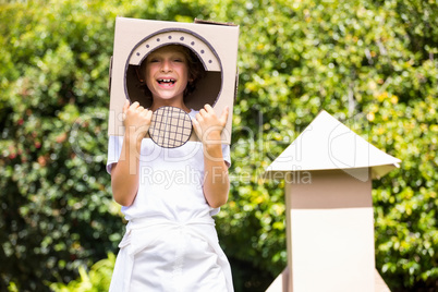 A little girl is smilling with her costume