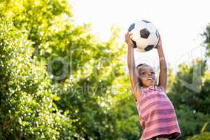 Boy is catching a soccer ball