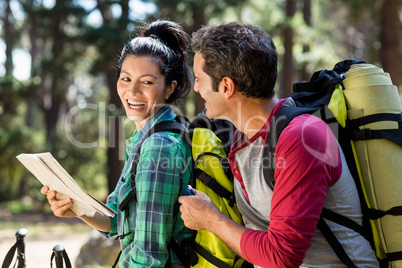 Couple smiling and hiking