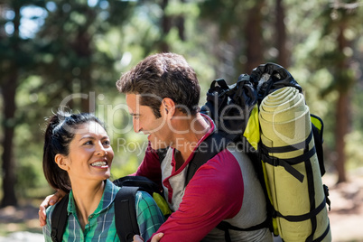 Smiling couple hiking