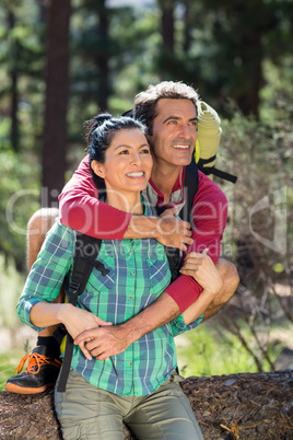 Couple smiling and holding each other