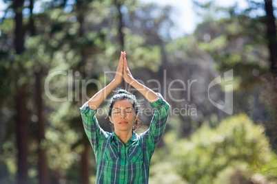 Attractive woman doing yoga