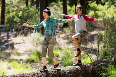 Couple smiling and walking with balance