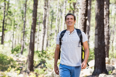 Man smiling and hiking