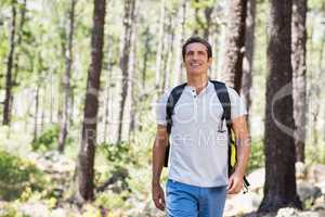 Man smiling and hiking