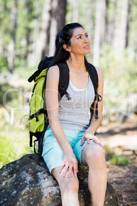 Woman sitting and looking up