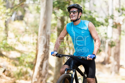 Man posing with his bike