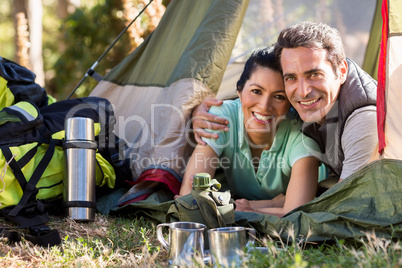 Couple laying and holding each other