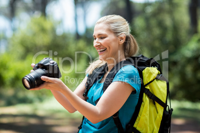 Woman smiling and looking her camera