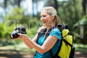 Woman smiling and looking her camera