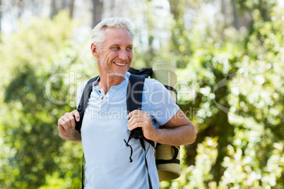 Man smiling and hiking