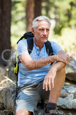 Hiker sitting on a rock