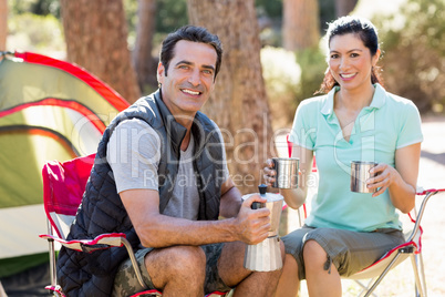 Couple sitting and taking some drink