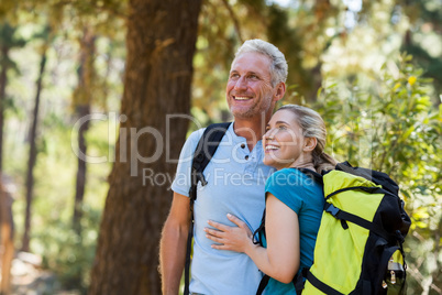 Couple looking something and holding each other