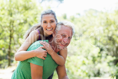 Couple smiling and holding each other