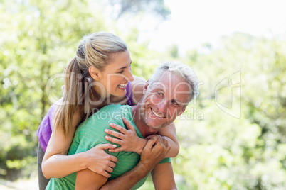 Couple smiling and holding each other