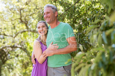 Couple smiling and holding each other