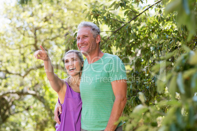 Couple smiling and pointing