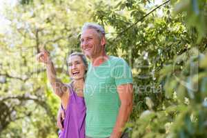 Couple smiling and pointing