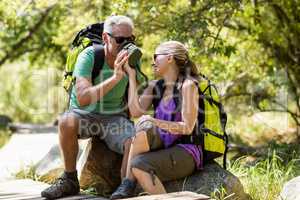 Couple taking a break during a hike