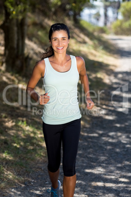 Woman smiling and running