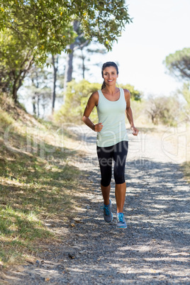 Woman smiling and running