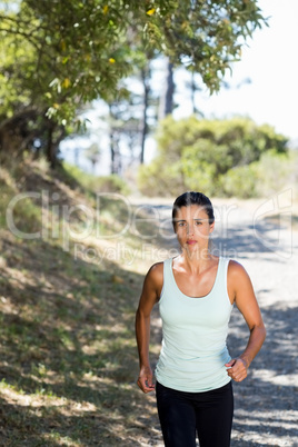 Front view of woman jogging